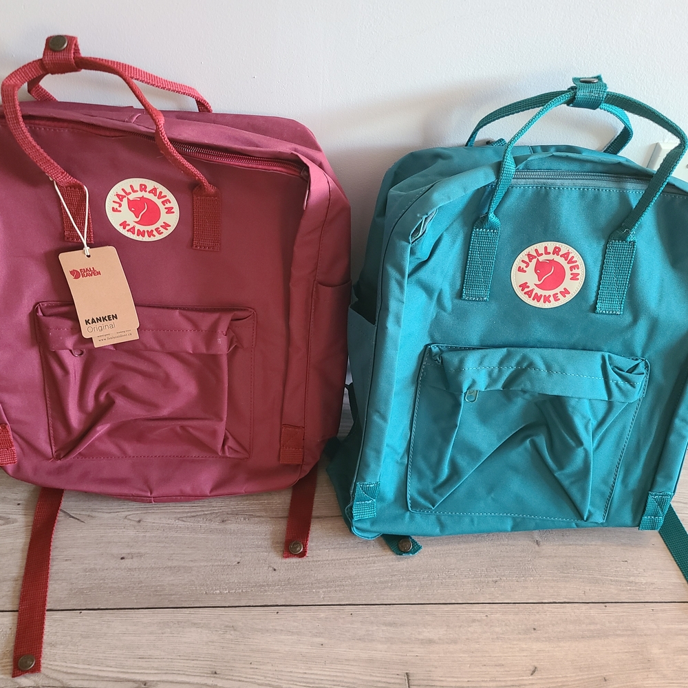 Fjallraven Kanken Backpacks in Red and Teal